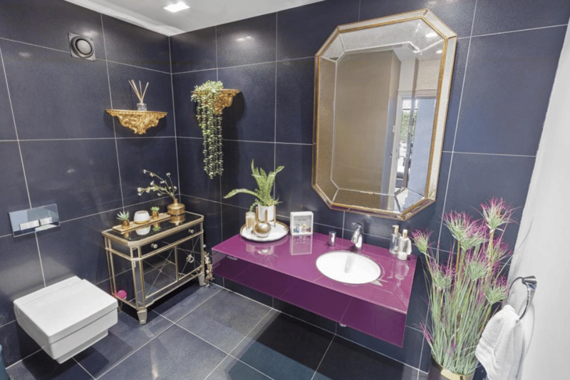 One of the cleverly styled five bathrooms