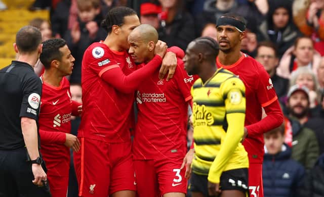 LIVERPOOL, ENGLAND - APRIL 02: Fabinho of Liverpool celebrates with teammates after scoring their team’s second goal from the penalty spot during the Premier League match between Liverpool and Watford at Anfield on April 02, 2022 in Liverpool, England. (Photo by Clive Brunskill/Getty Images)