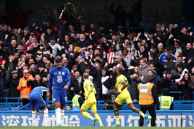 The Brentford man celebrates after scoring his side’s second goal in front of fans  during the game