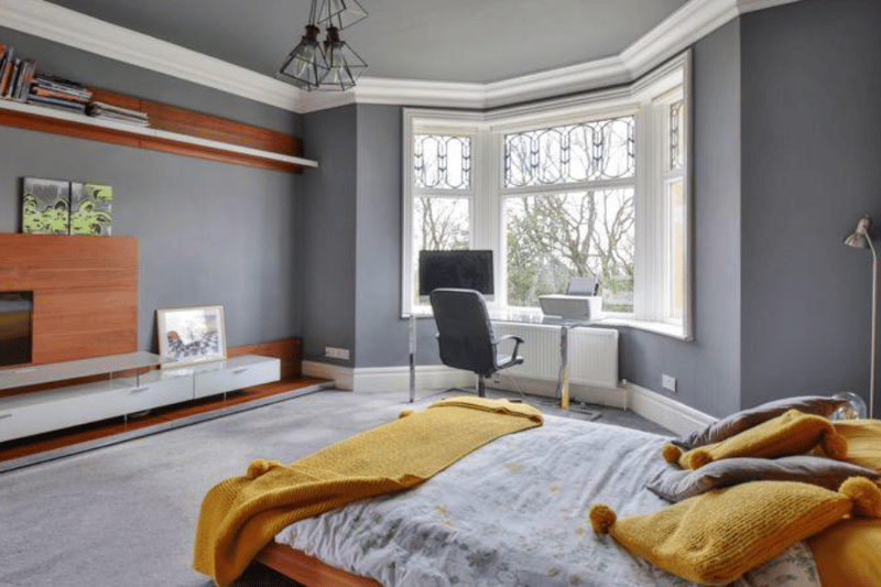 The five double bedrooms have character-filled bay windows with views to the garden