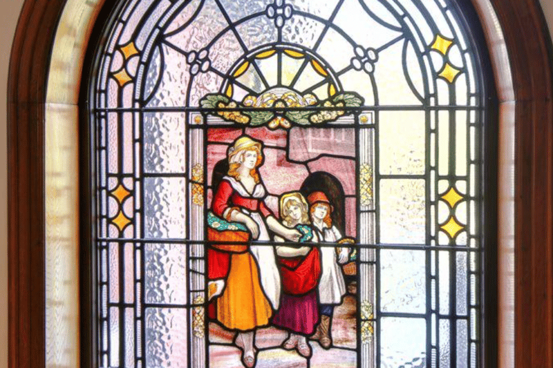 One of original stained glass windows in the hall in this 1920s property
