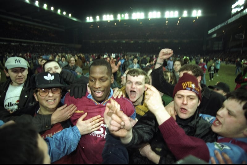 The late Ugo Ehiogu celebrates with fans after the Coca Cola Cup sei-final against Arsenal.