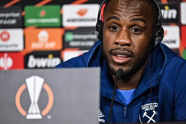 West Ham Uniteds Jamaican forward Michail Antonio answers journalists questions on the eve of the UEFA Europa League (Photo by JEFF PACHOUD/AFP via Getty Images)