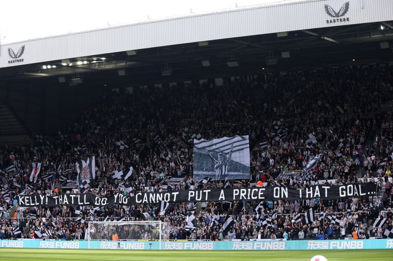 Newcastle United fans unveil a flag in memory of former player David Kelly prior to the Premier League match between Newcastle United and Leicester City at St. James Park.