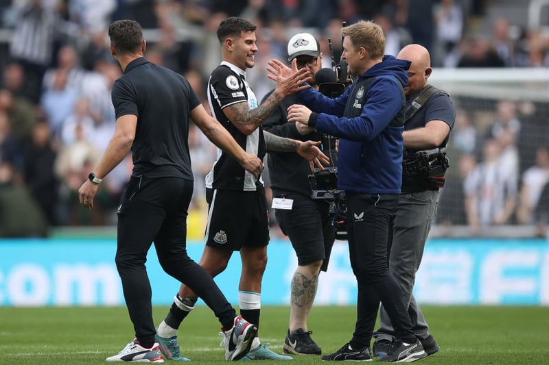 Newcastle United head coach Eddie Howe and midfielder Bruno Guimaraes celebrate after the 2-1 win against Leicester City. 