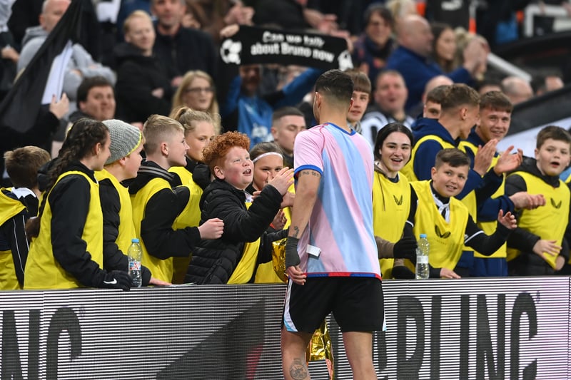 The Brazilian sensation enjoys his team’s win with younger members of their fan base as he high fives the young boys and girls after putting in a sensational performance at St James’ Park just moments before