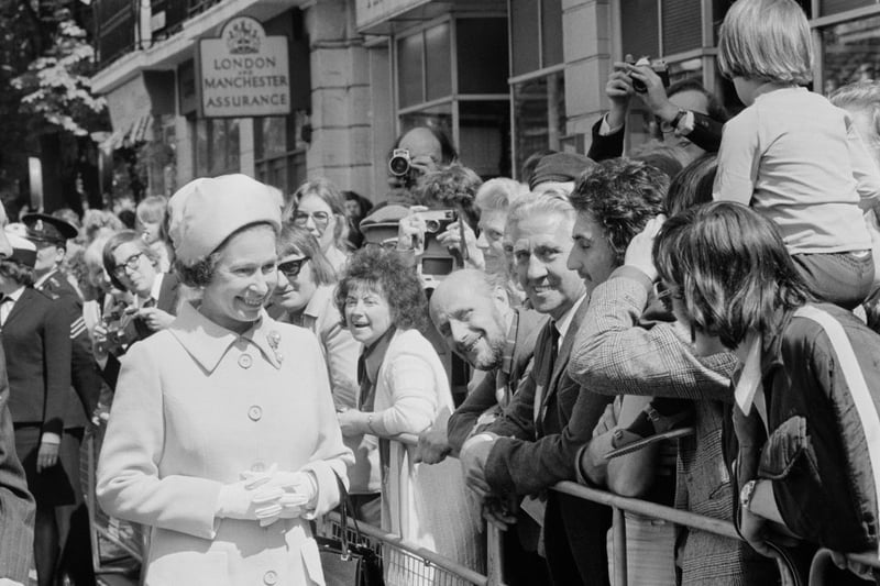 Queen Elizabeth II meets members of the public during a visit to Greenwich on  May 20 1975.