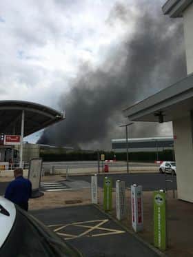 Smoke coming out of the Recycling Lives site as firefighters tackle the significant blaze