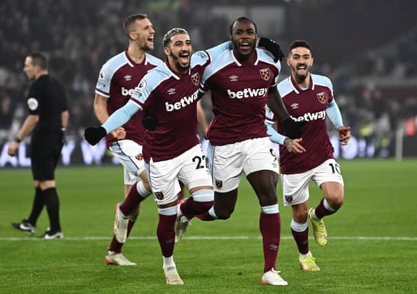 Michail Antonio of West Ham United celebrates after scoring their side's first goal . (Photo by Alex Broadway/Getty Images)