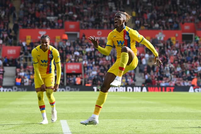  Wilfried Zaha of Crystal Palace celebrates after scoring a late winner (Photo by Mike Hewitt/Getty Images)
