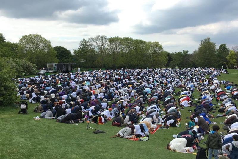 People gather to pray in  Mountsfield Park, Lewisham to mark the end of Ramadan.