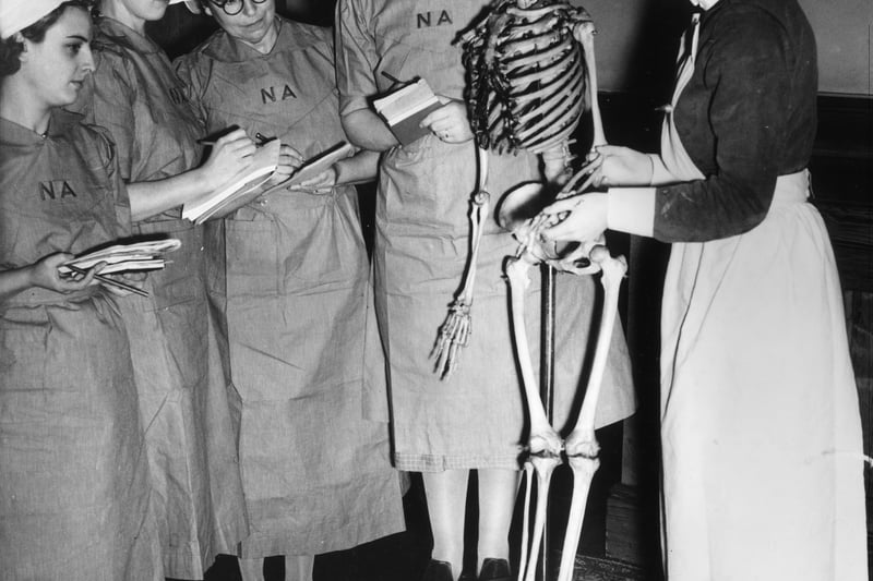 11th July 1940:  Nursing Auxiliaries receiving instruction on anatomy at the Booth Hall Hospital, Manchester. Nursing Auxiliaries supplement hospital staff and man first aid posts as well as carrying on with their civil jobs as far as possible.