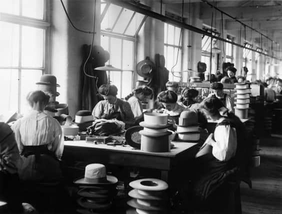 July 1909:  Women making hats at the Sutton & Torkington factory in Manchester