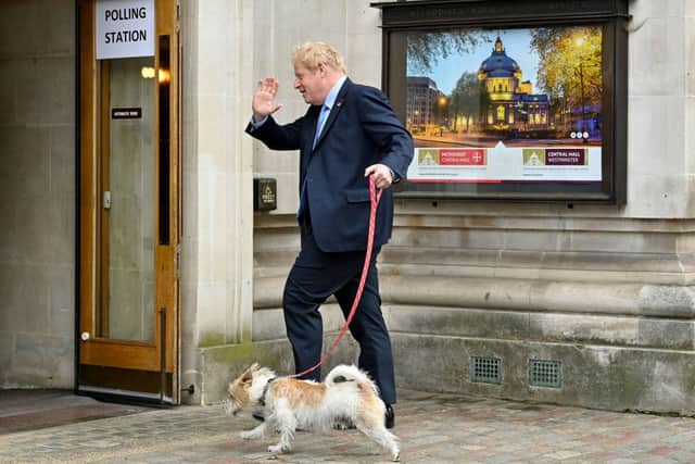 Boris Johnson voting with his dog Dilyn at Methodist Hall in Westminster. Credit: JUSTIN TALLIS/AFP via Getty Images