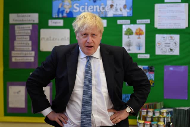 Prime Minister Boris Johnson during a visit at the Field End Infant school, in South Ruislip, following the local government elections (PA)