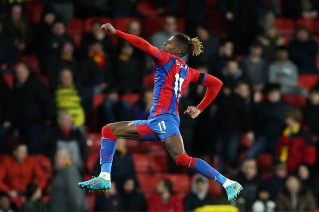 Wilfried Zaha of Crystal Palace celebrates after scoring their team's fourth goal during the Premier (Photo by Eddie Keogh/Getty Images)