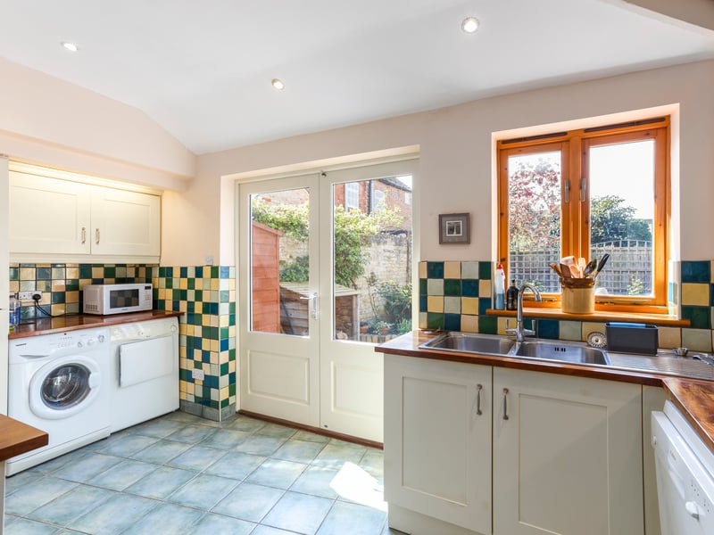 An adjoining wooden floored, glass roofed office/garden room is also accessed from the dining room and has double doors to the garden. 