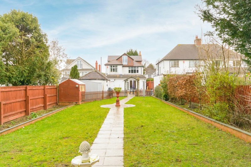 The home is situated on a large plot allowing for parking for several cars, a substantial garage and a impressive rear garden with a south-westerly aspect.