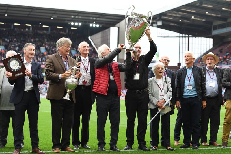 The class of 1982 raise the Champions League trophy 40 years on.