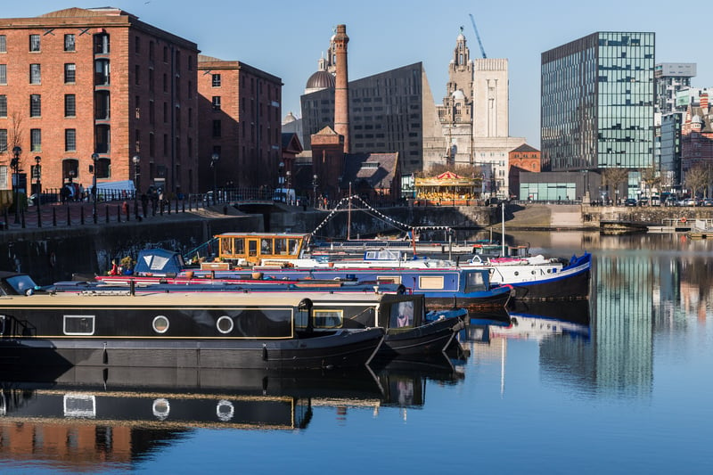 Boats moored in the still waters of Salthouse Dock.