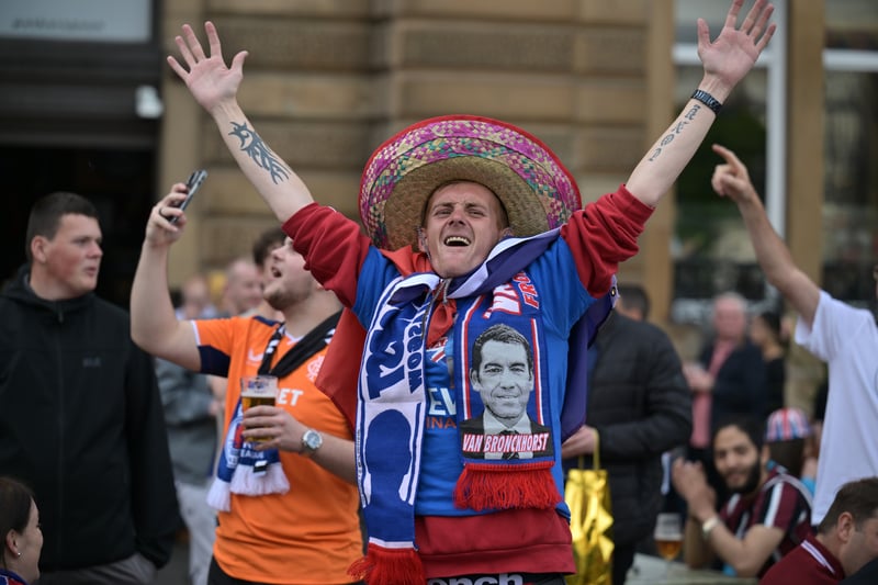 Rangers fans in full voice ahead of the final, with one donning a sombrero. 