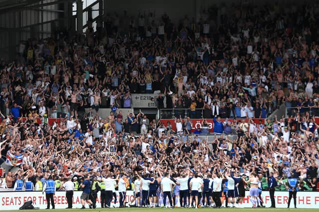 The full-time whistle blows and Leeds United players, coaching staff and supporters celebrate Premier League survival!