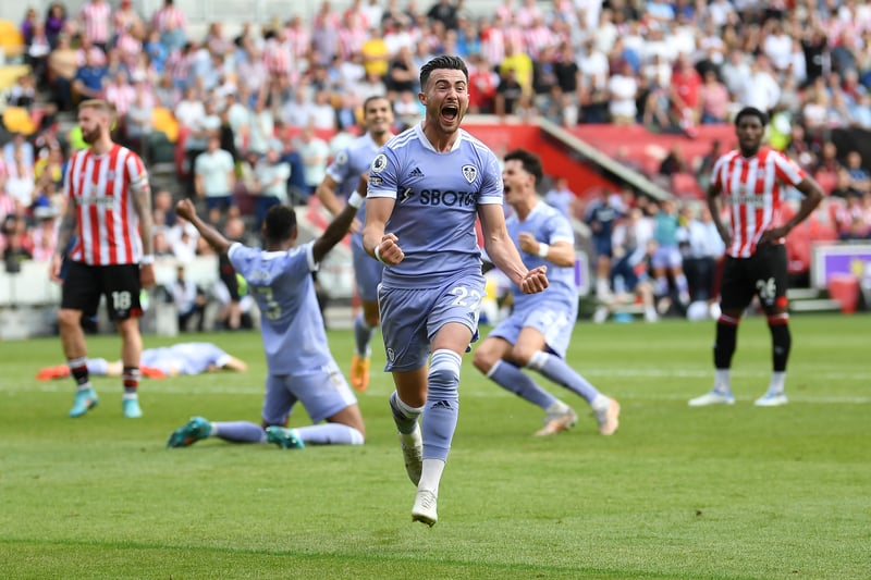 Jack Harrison heads towards the Leeds United supporters as his goal puts them on the brink of Premier League survival.