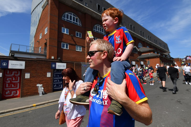 Crystal Palace fans arrive at the stadium prior to the Premier League match 