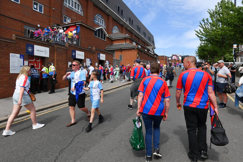 Fans arrive at the stadium prior to   the Premier League match 