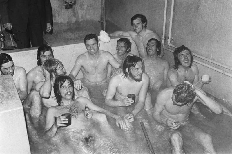 Players of Birmingham City FC in a communal bath after the team was promoted to the First Division following their 1-0 victory over Leyton Orient.