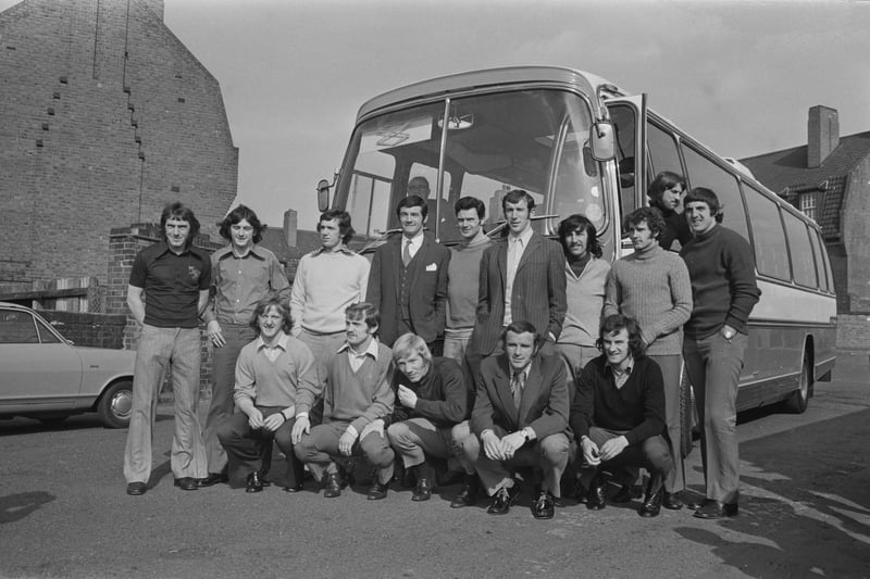 The Birmingham City football team pose together in front of their team coach prior to travelling to an away match in April 1972