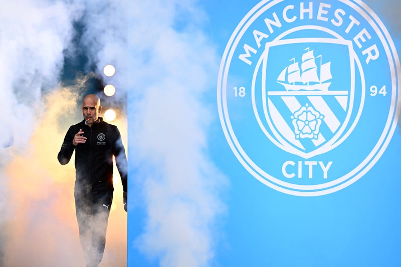 Pep Guardiola arrives on stage at the Beetham Tower