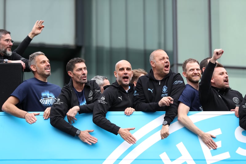 Pep Guardiola, manager of Manchester City, acknowledges the excited fans