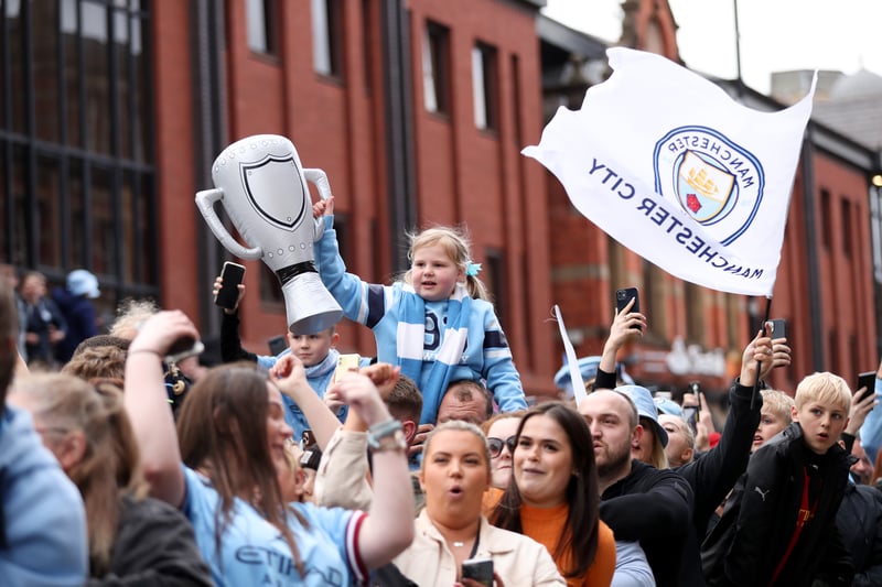 Fans of all ages lined city centre streets to await their heroes