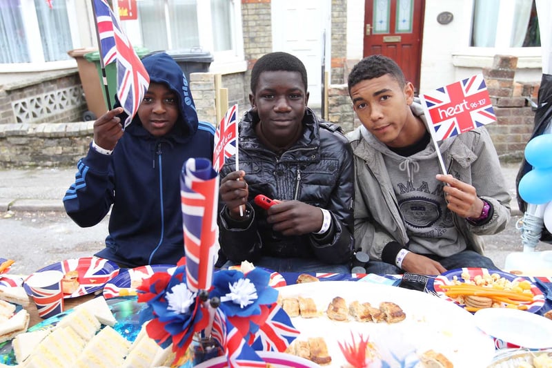 Fletton Avenue residents Brandon Kpemou, Yves Kpemou and Jordy Link enjoy their Diamond Jubilee street party in aid of the Rudolf Fund on Tuesday 5th June 2012. 