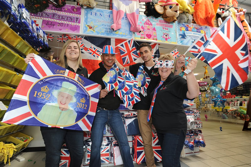 Party Place staff (l-r), Emma Saunders,  Ricky Heppolette, Christopher Heppolette, Shirley Marshall, with Queens's Diamond Jubilee Flags
