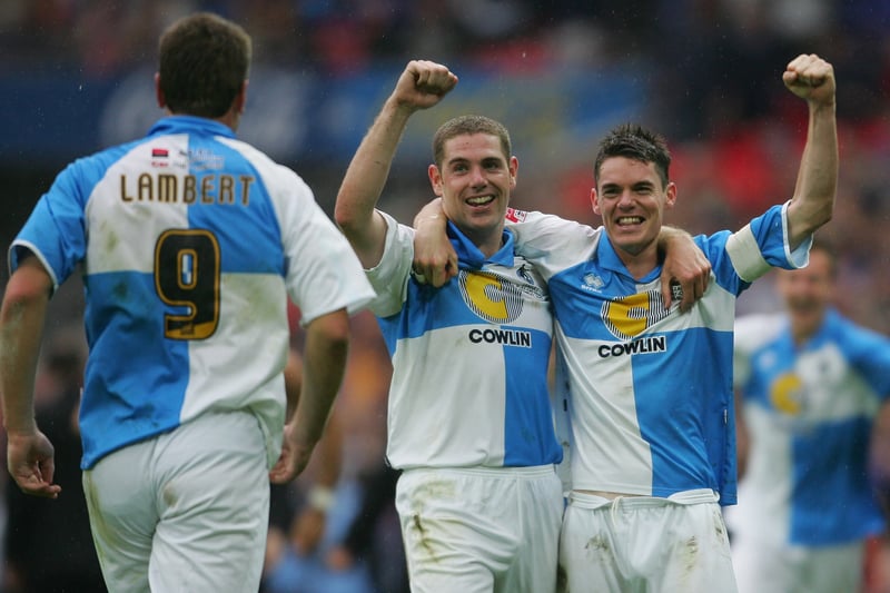 Two-goal hero Richard Walker and Stuart Campbell celebrate as Rickie Lambert joins them at the final whistle