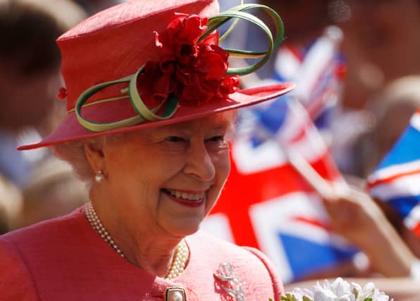 Queen Elizabeth II greets wellwishers at Victoria Square, Birmingham during her Diamond Jubilee visit to the City on July 12, 2012 (Photo by Christopher Furlong/Getty Images)