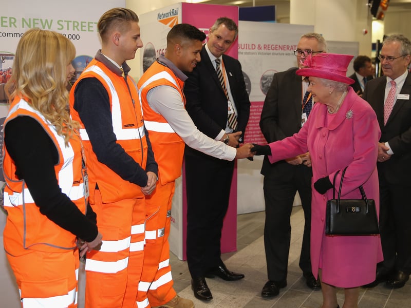 Queen Elizabeth II talks to Network Rail trainess during the official opening of the refurbished Birmingham New Street Station on November 19, 2015 (Photo by Christopher Furlong/Getty Images)