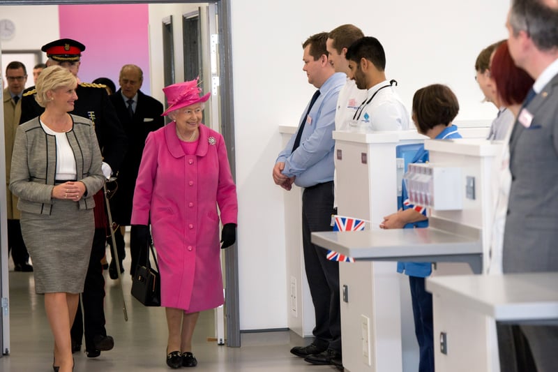 Queen Elizabeth II with Tracey Taylor Head of the NHS Trust tours the new Birmingham Hospital and School of Dentistry before officially opening the building (Photo by Richard Stonehouse - WPA Pool/Getty Images)