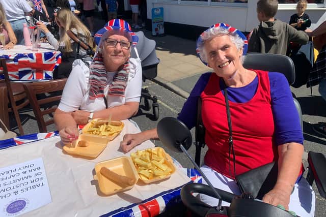 Pat Firth and Josie Turpin, both from Lee, enjoying their fish and chips