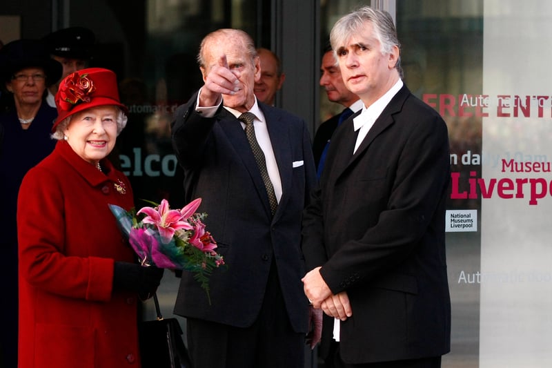 Queen Elizabeth II, Prince Philip, Duke of Edinburgh and Chairman of National Museums of Liverpool Phil Redmond talk during a visit to the Museum of Liverpool.
