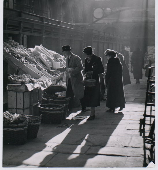 Shoppers browse items - Picture date unknown