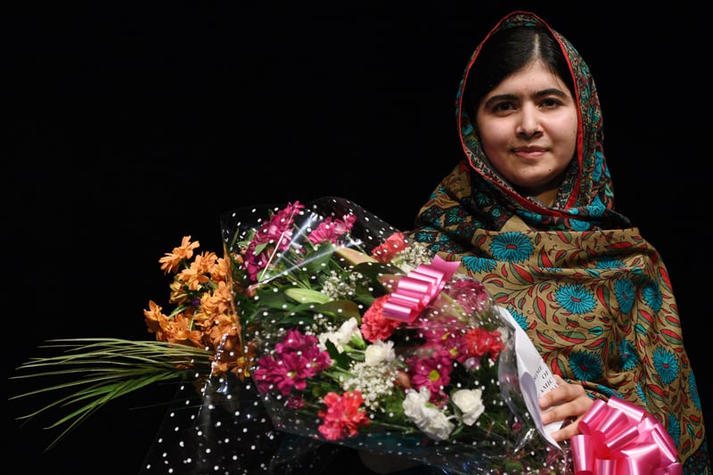 Pakistan-born Malala is a Birmingham resident. She was only 15 when she defied terrorists who shot her in the head in an attempt to silence her. She became a powerful global voice demanding education for girls. (Photo credit - OLI SCARFF/AFP via Getty Images)