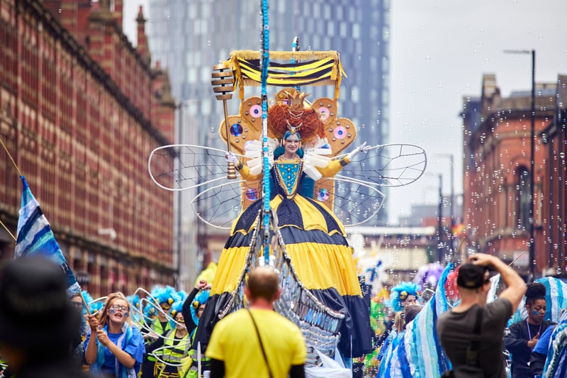 The parade makes its way along Deansgate