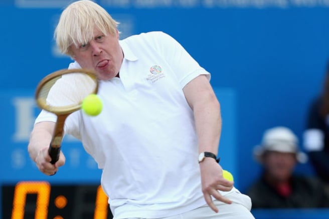 London Mayor Boris Johnson in action during the Rally Against Cancer charity match on day seven of the AEGON Championships at Queens Club on June 16, 2013 .