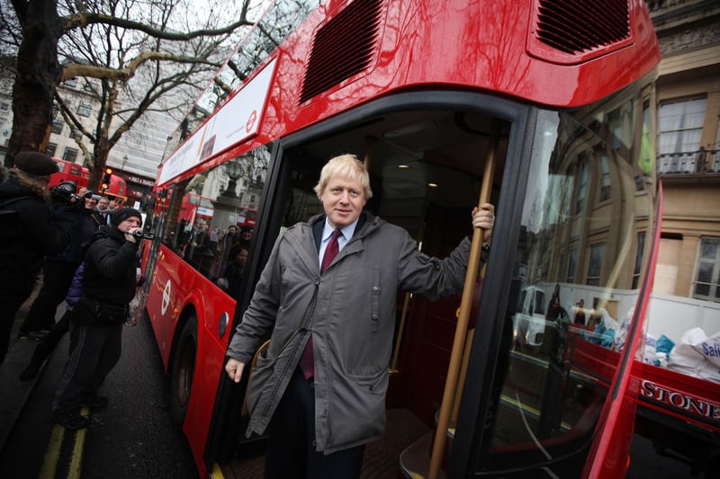 Boris Johnson as London Mayor travels on a new prototype red double decker bus near Trafalgar Square on December 16, 2011.