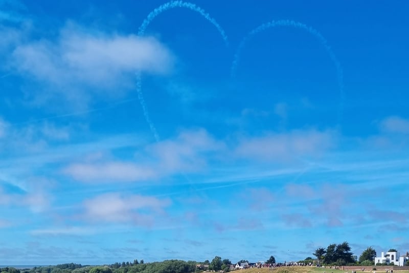 The Red Arrows make a heart as they end the display.