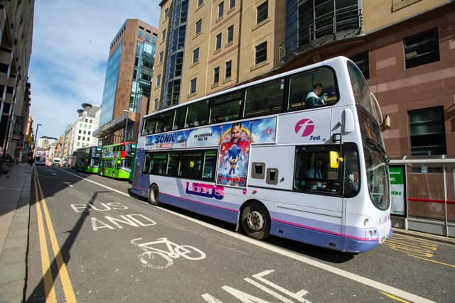 A First bus travelling through Leeds city centre.
