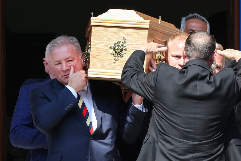 Ally McCoist sheds a tear as he carries Andy Goram’s coffin alongside his son Danny at Wellington Church